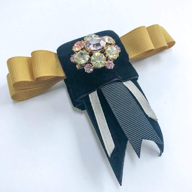 Vintage brooch colored diamonds black velvet yellow ribbon
