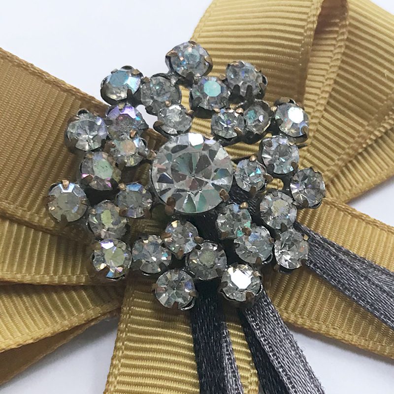 Vintage brooch diamonds yellow ribbon